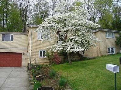 All brick home in a private setting and is surprisingly spacious with updates 