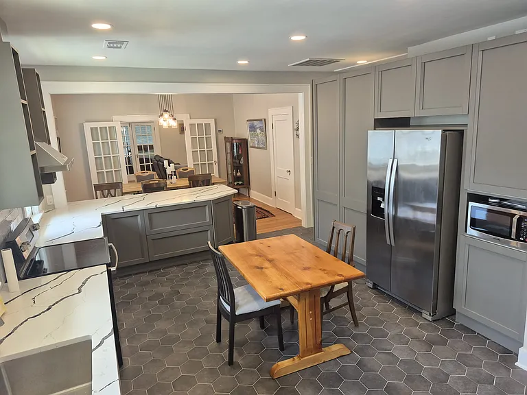 Italian cabinetry, new flooring and appliances.