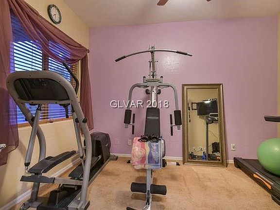 Den/Office . Room could be used as a Gym.