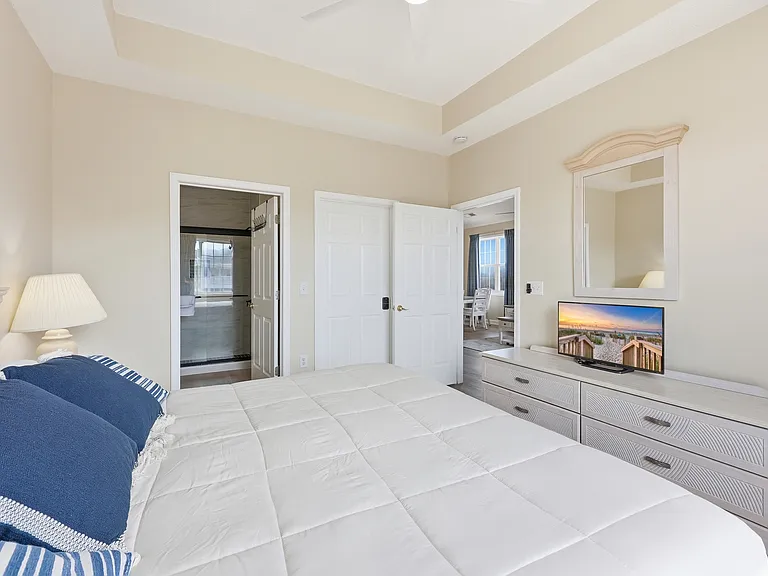 Unwind in this cozy bedroom with a luxurious king bed.