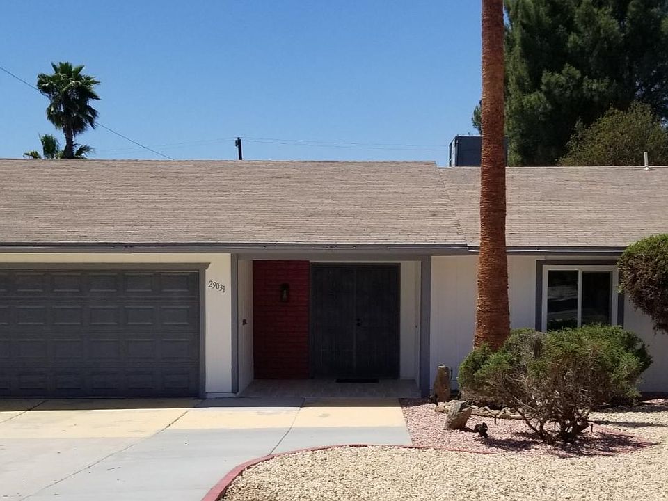 Newly painted exterior, redwood fence & gates on each side for added security.