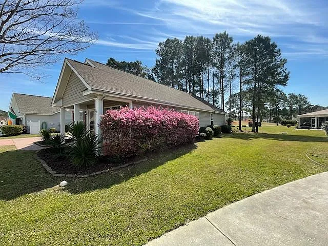 Well manicured landscape brings joy to the property.