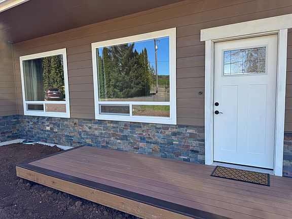 Covered front porch (5' X 20'). The perfect place to watch sunsets.