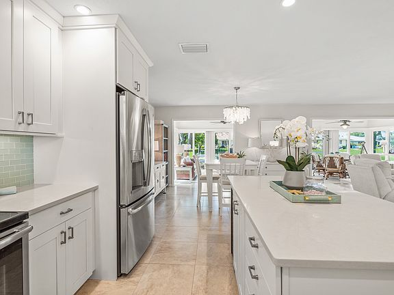 Kitchen area with view of Florida room.