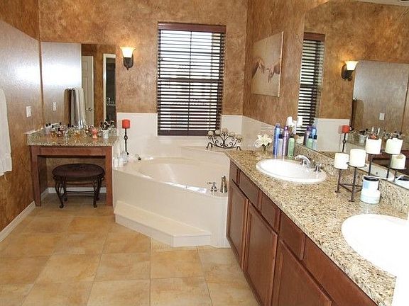 Upgraded Master Bath with granite countertops and upgraded shower.