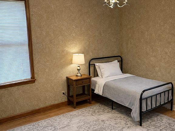 One of the bedrooms has a Twin bed and also a desk!