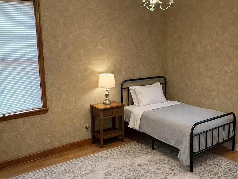 One of the bedrooms has a Twin bed and also a desk!