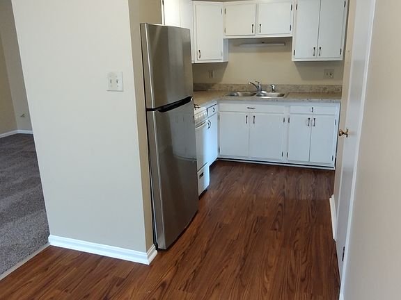 Kitchen with newer appliances, upgraded counters & lots of cabinets!