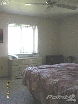 Bedroom 2, there is a third bedroom located in the walk-out basement.