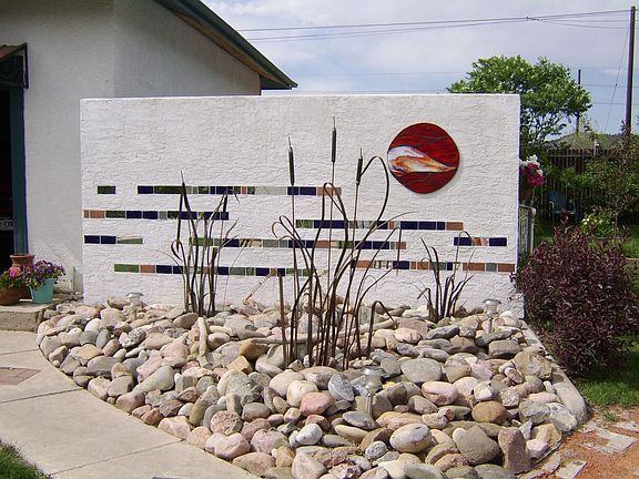 Mosaic with beautiful metal sculptures