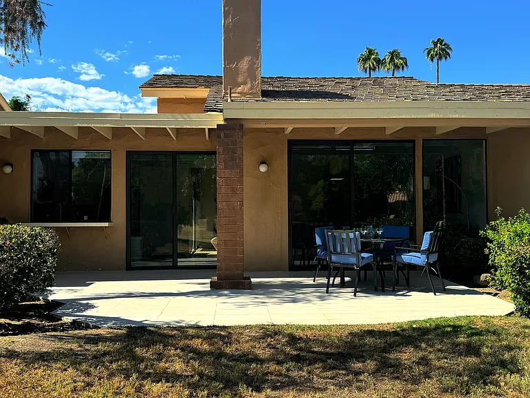 Patio access from kitchen and living room, includes patio set and propane BBQ grill