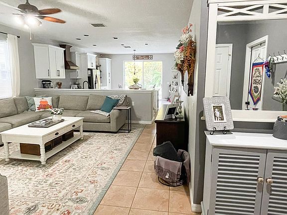 Shows family room and open kitchen floor plan.