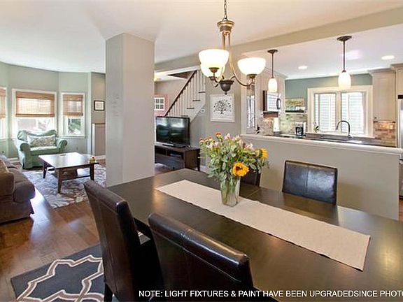 Dining/Living Room. Note: light fixtures and paint have been upgraded.