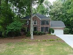 Front - New driveway and landscaping