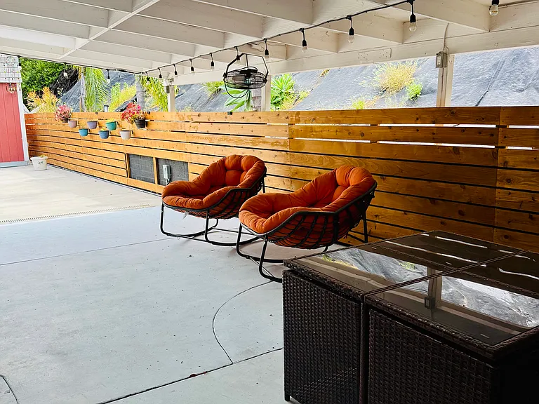 View from covered patio toward the open yard area
