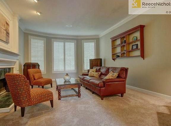 Spacious great room complete with beautiful fire place and wall