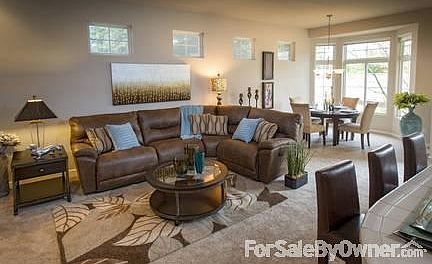 Family Room perfect for entertaining
						:
						Spacious, light-filled family room features new La-Z-Boy sectional just for you!