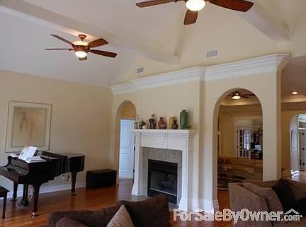 Sunroom with vaulted ceiling