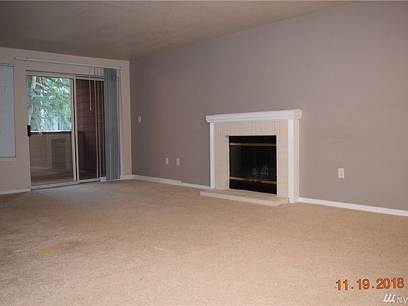 Wood burning fireplace will provide hours of warmth with glass doors
