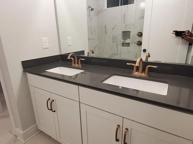 double sink with champagne bronze faucet