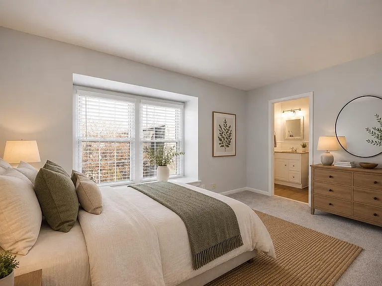 Comfortable secondary bedroom offering flexibility for guests, a home office, or additional living space. Photos are virtually staged.