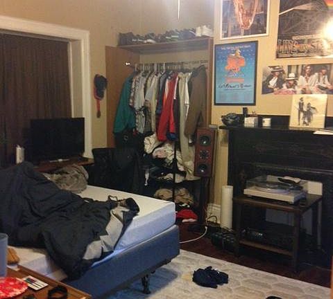 into 1st Floor BedRoom with Original Mantel& Open Closet