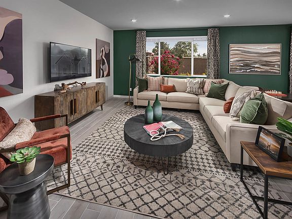 Residence 2 living room modeled at a nearby Meritage community.