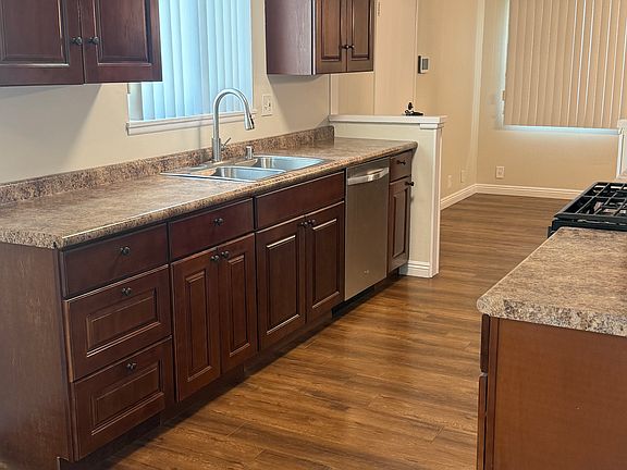 Newer kitchen remodel with dishwasher, microwave and gas stove