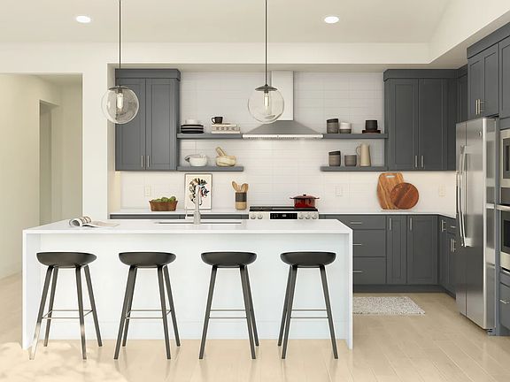 Kitchen with pendant lighting and floating shelves