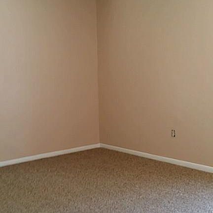 bedroom with new carpet