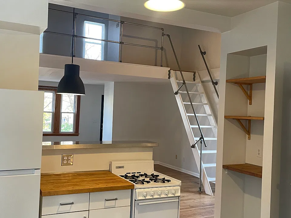 Central kitchen w/bar thru to great room