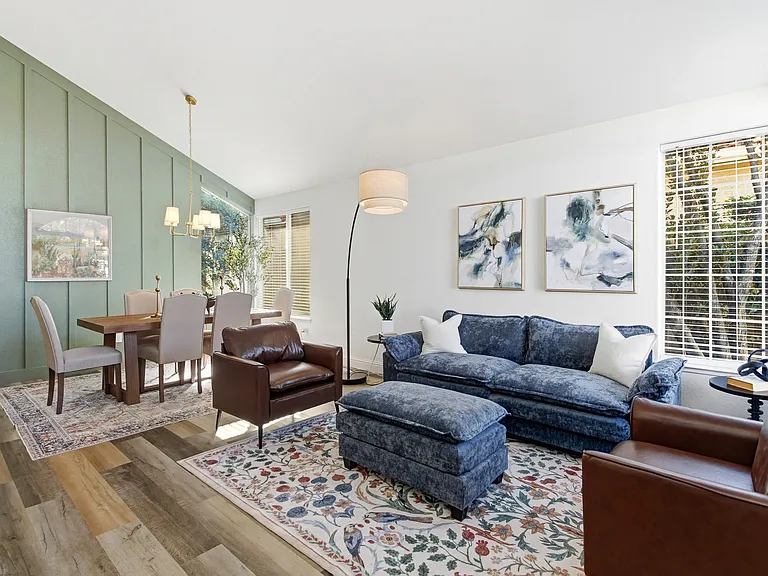 Open-concept living room with modern design and natural light
