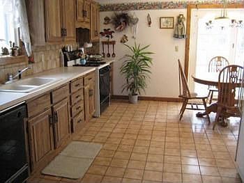 KITCHEN OPEN TO INFORMAL DINING