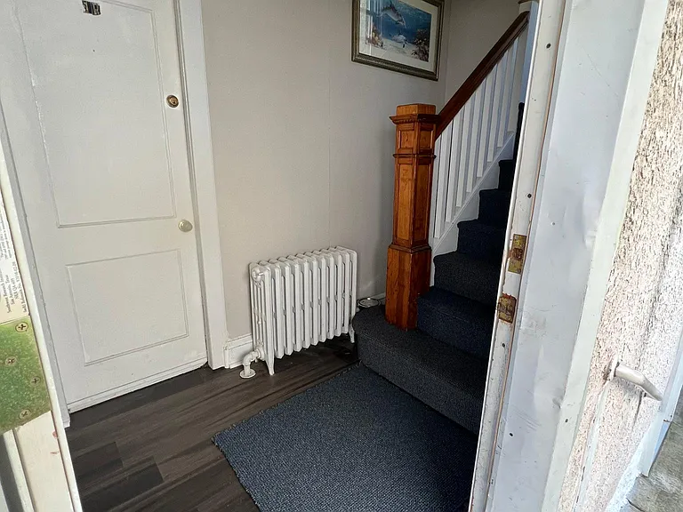 Hallway leading to apartment