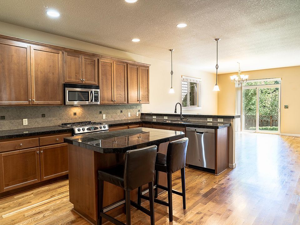 Kitchen & Dining Area w/ Backyard access
