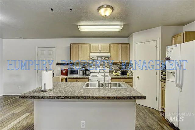 9963 W Tilmont St — Photo 8
