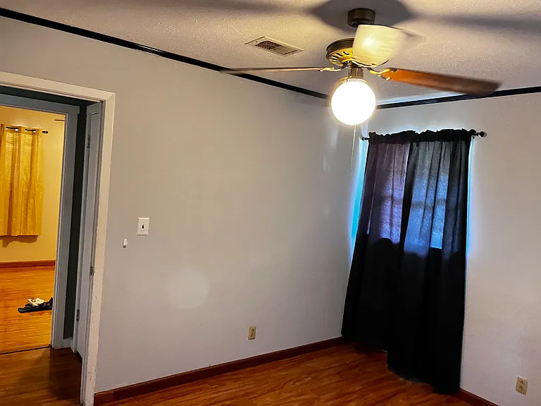2nd Bedroom (queen fits for sure- king is possible)