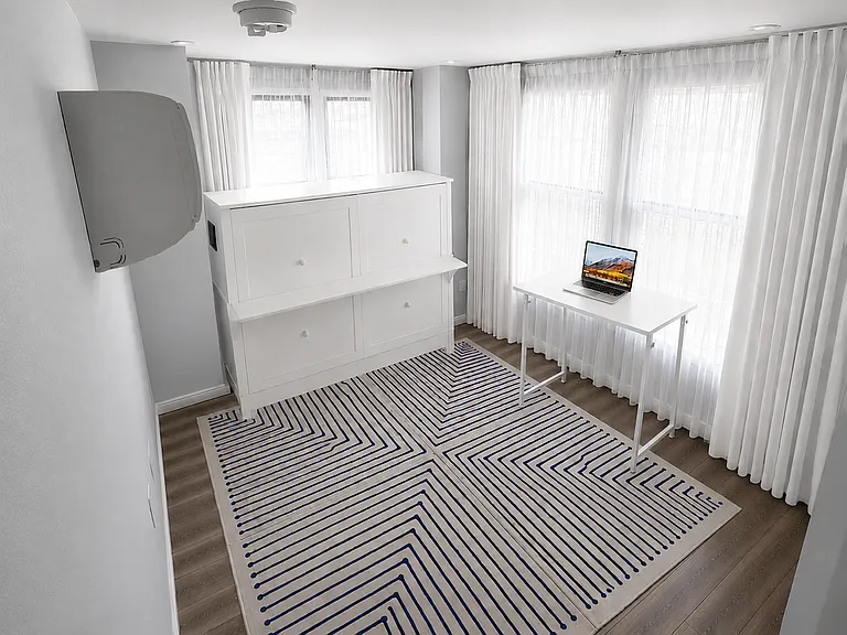 Work from home comfortably with a dedicated office that disappears when it's time to relax.