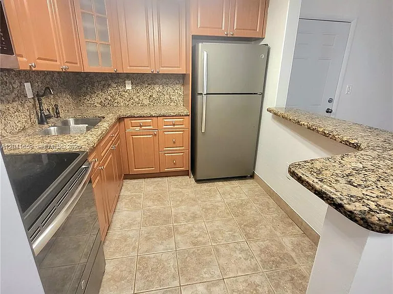 18845 NW 62nd Ave #207 — Photo 3