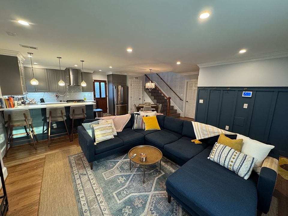 Large open concept living room, kitchen, dining room