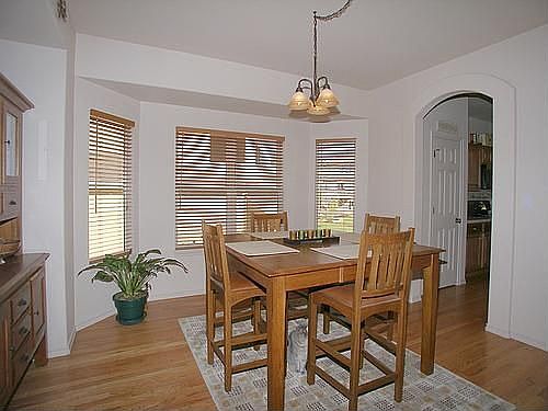 Formal dining room with bay window