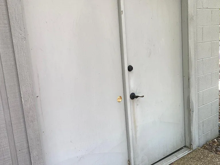 DOOR TO LARGE STOREROOM/SHOP