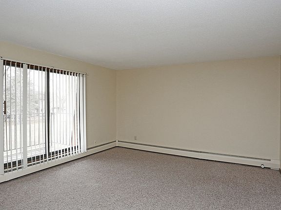 Large patio windows allow for a beautiful view.