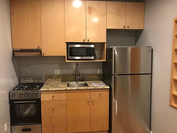 All stainless steel appliances and granite countertop.