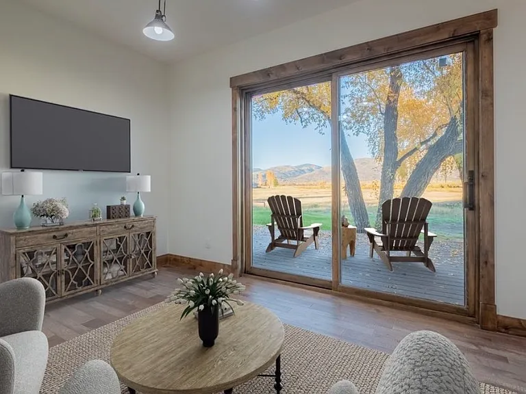 Main Floor Guest Suite living room, with en suite bathroom and separate bedroom