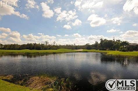 Lake and golf view screened lanai.