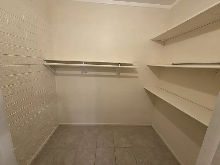 Large closet for downstairs bedroom #1