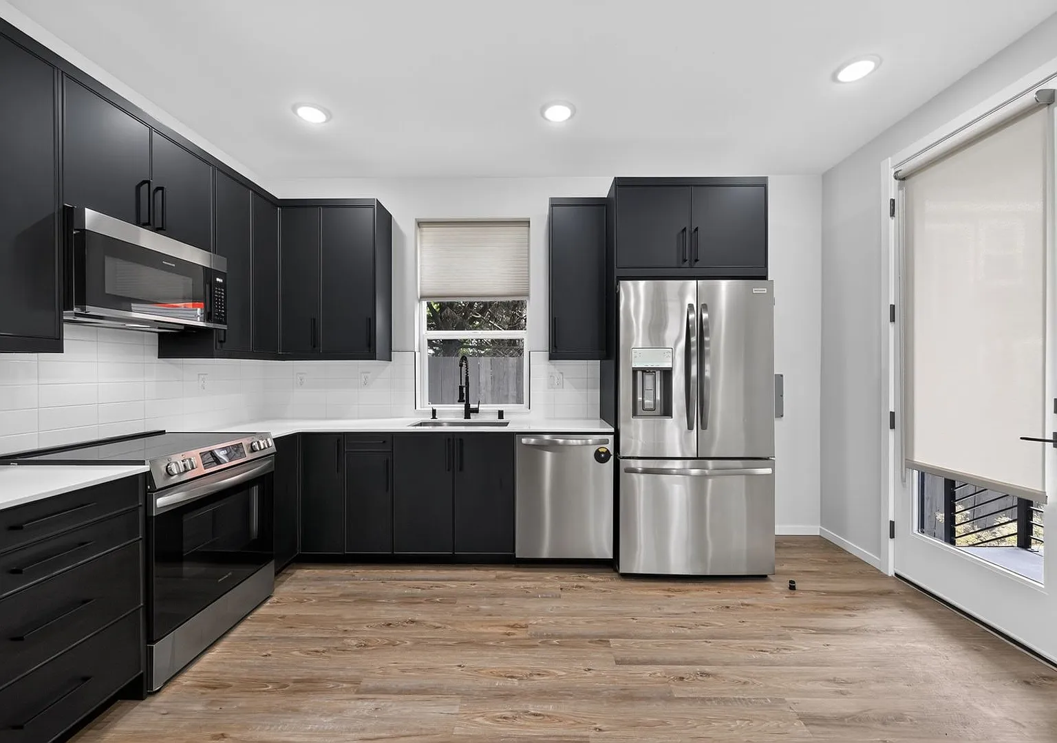 Modern 1-Year-Old Home in Central District w/ Private Rooftop Deck, Lower-Level Private Suite & M... — Photo 3