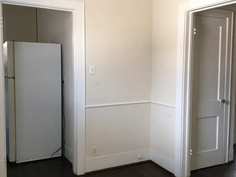 View from breakfast room or office next to kitchen on left inside. Closed door is a linen closet in the living room.