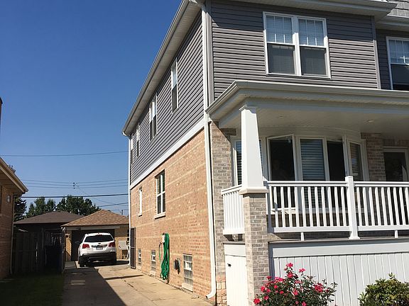 Side Drive to Brick Garage